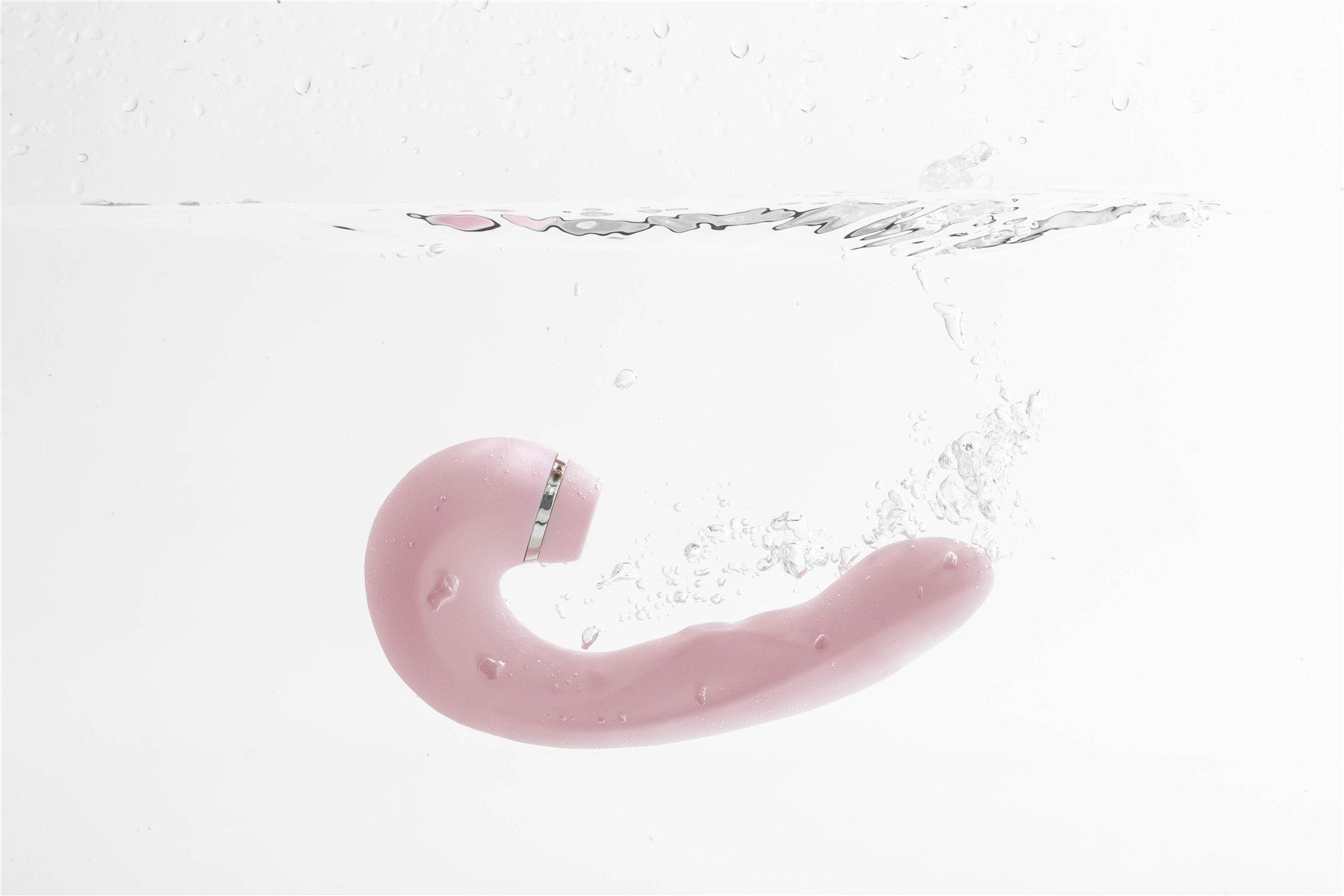 Fae Thrive vibrator in roze onder water